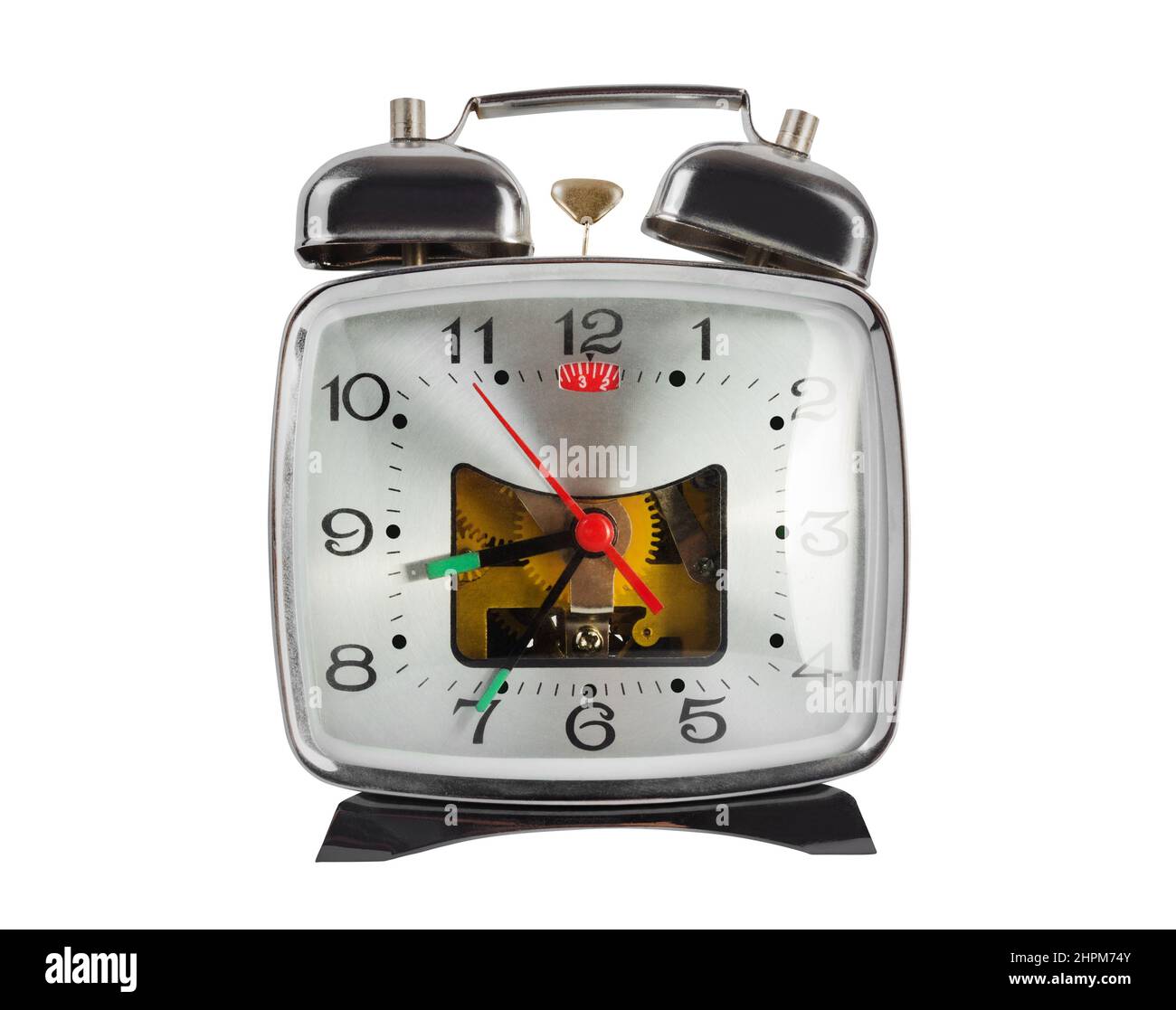 Isolated photo of chrome metal alarm clock with visible mechanism on white background Stock