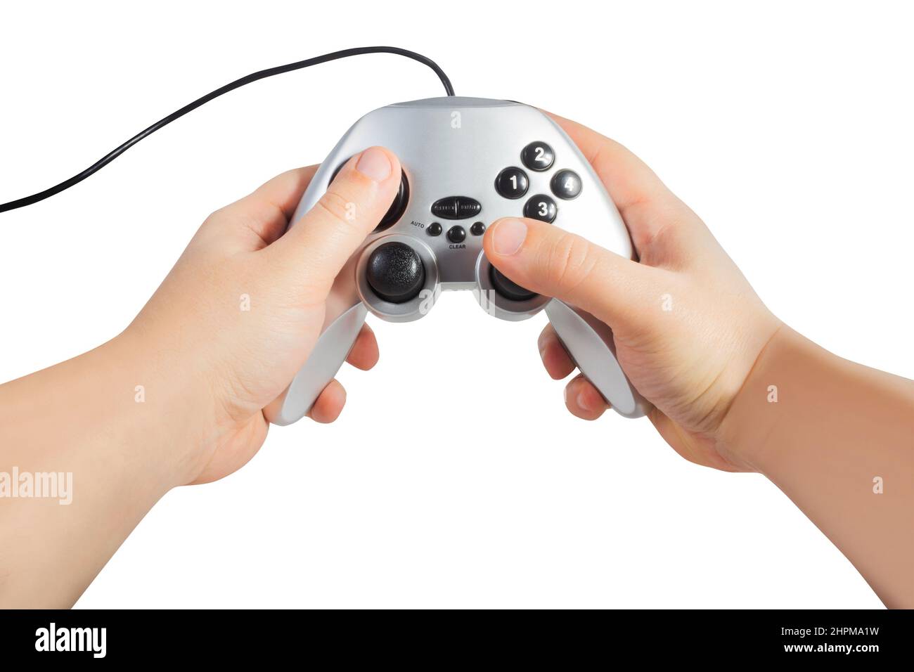Isolated photo of first person view male hands holding silver colored and wired modern game pad controller on white background. Stock Photo