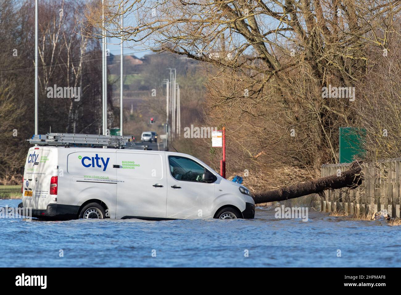 Barnsdale Road in Castleford is closed as trees fall and vehicles get stuck on the flooded road