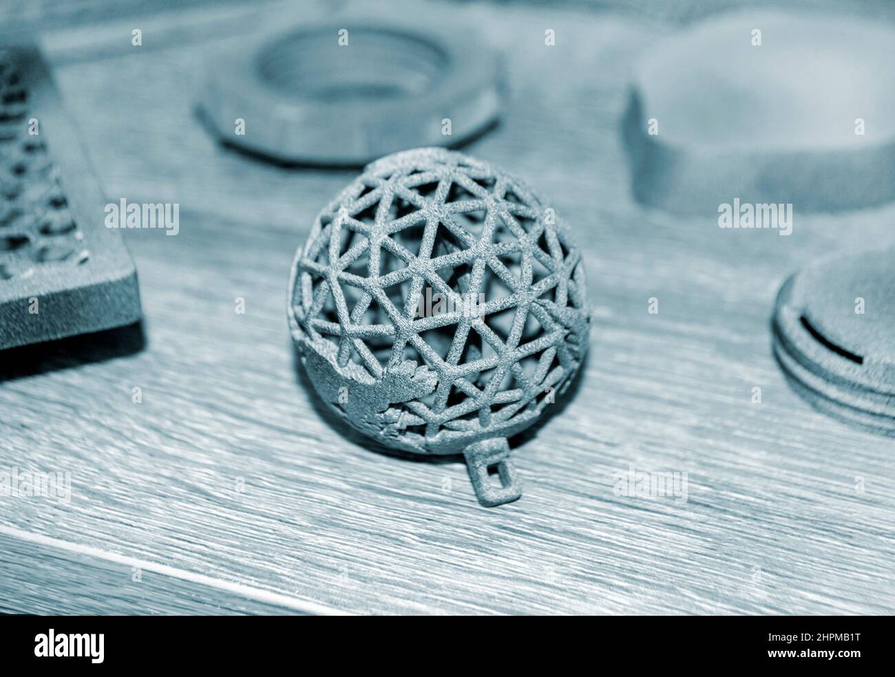 Gray abstract models printed on 3d printer from powder close-up. Stock Photo