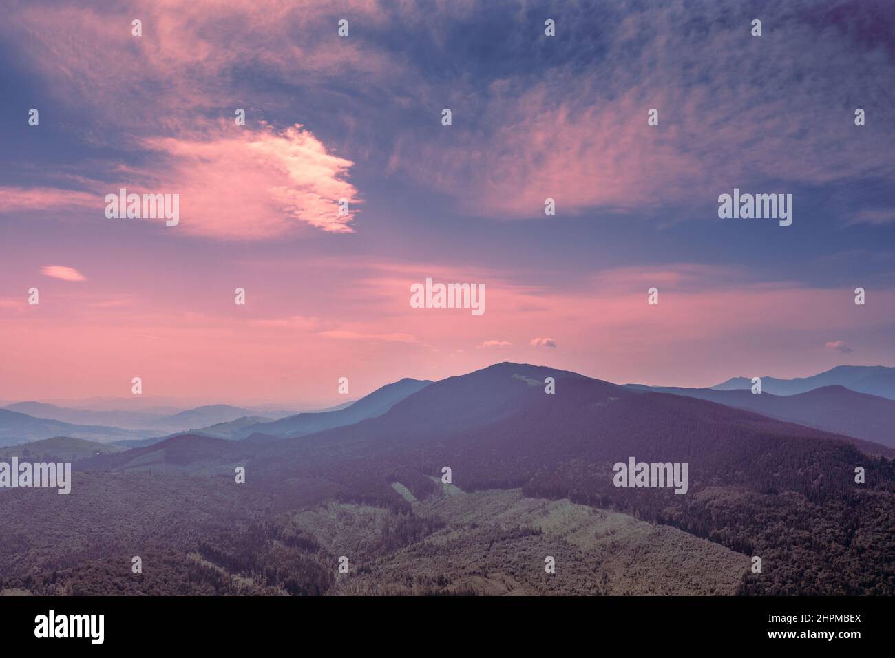 Mountain view against the background of the sunset sky in summer Stock Photo