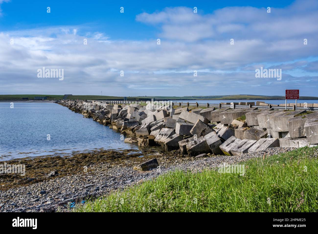 View of the Churchill Barrier, a causeway linking Mainland Orkney and the small island of Lamb Holm, Orkney Isles, Scotland, UK Stock Photo