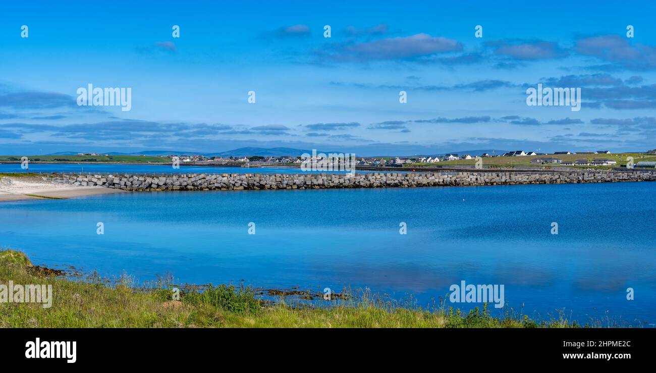Panoramic view of Churchill Barrier causeway from Lamb Holm looking towards Mainland Orkney in Scotland, UK Stock Photo
