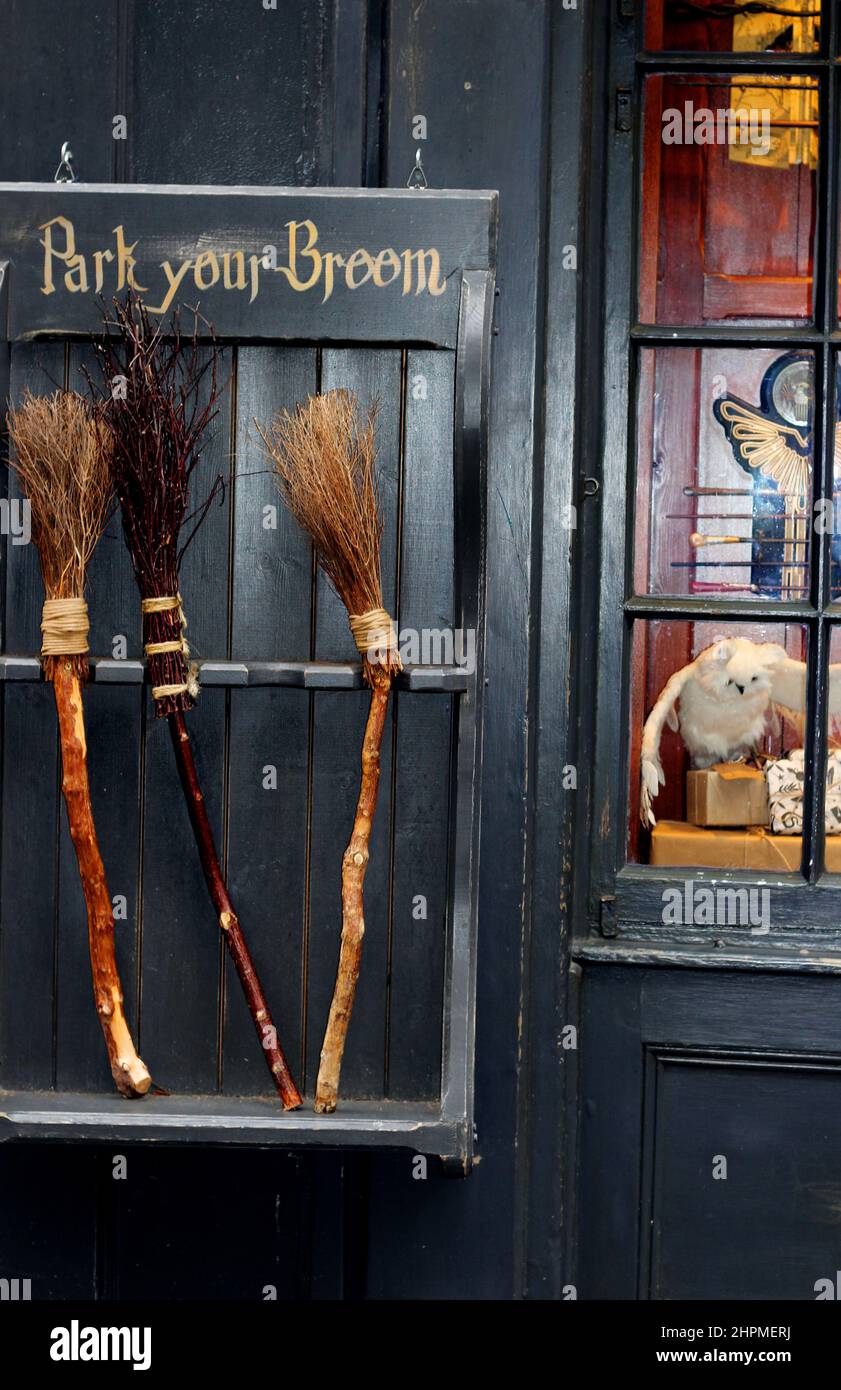 Broom parking outside a shop in York, England. The crooked paths of the Shambles have attracted numerous shops related to Harry Potter and wizardry Stock Photo