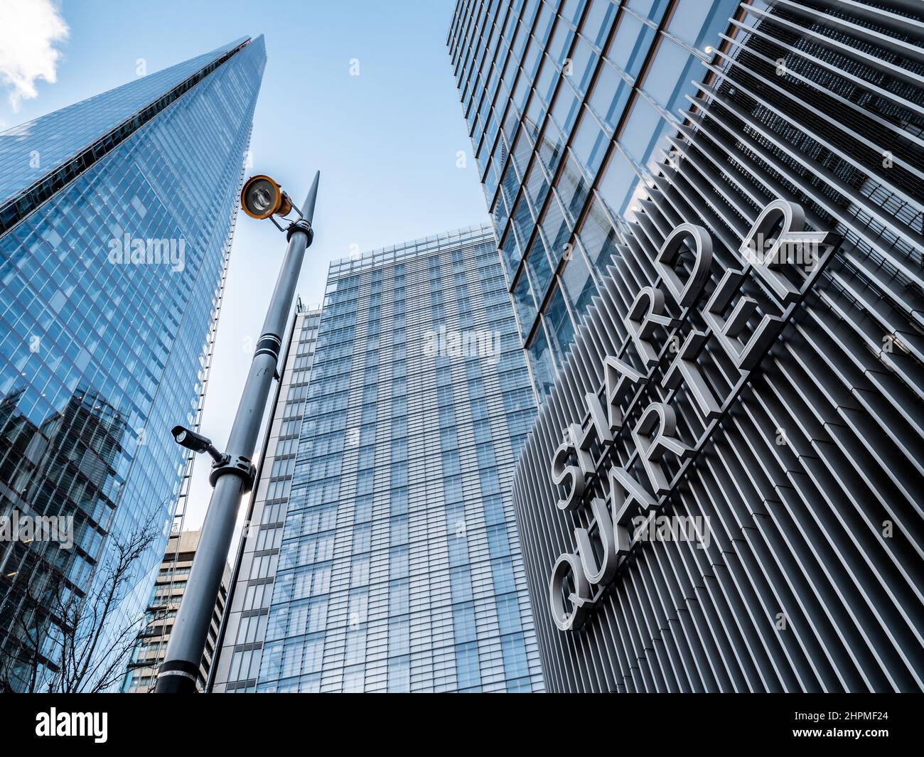 The Shard, London. A low, wide angle view of the modern business architecture and skyscrapers in the Shard Quarter near London Bridge train station. Stock Photo