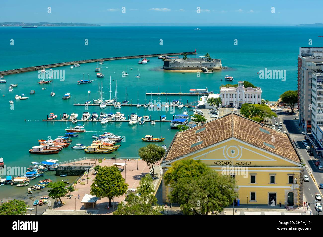 Mercado Modelo and old historic fortress at Todos os Santos bay in Salvador city, Bahia on a sunny day Stock Photo