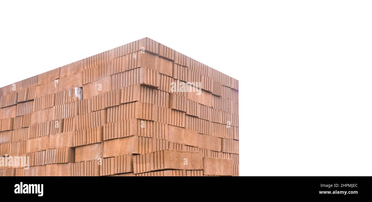 A bunch of brick blocks of building stone material on a white background, isolated. Stock Photo