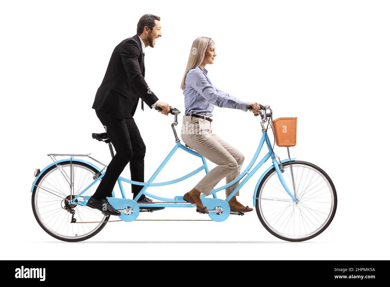 Young man and woman in formal clothes riding a tandem bicycle isolated on white background Stock