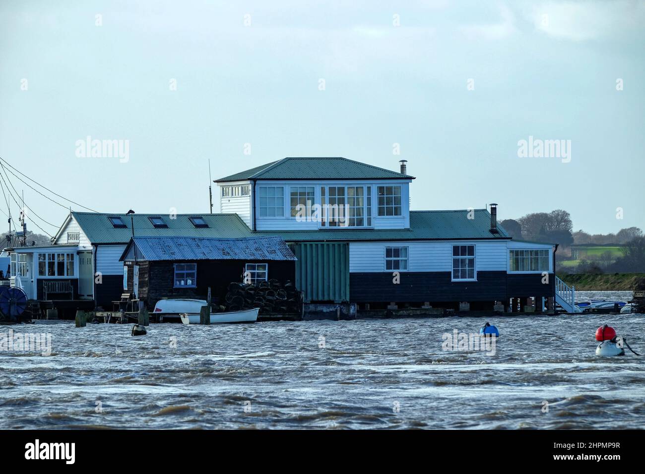 The Boat House Felixstowe ferry during spring high tide Stock Photo Alamy