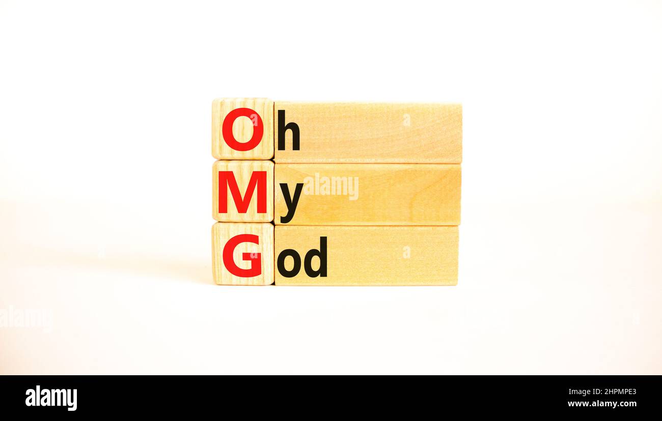 OMG oh my god symbol. Concept words OMG oh my god on wooden blocks on a  beautiful white table, white background. Business and OMG oh my god  concept. C Stock Photo -