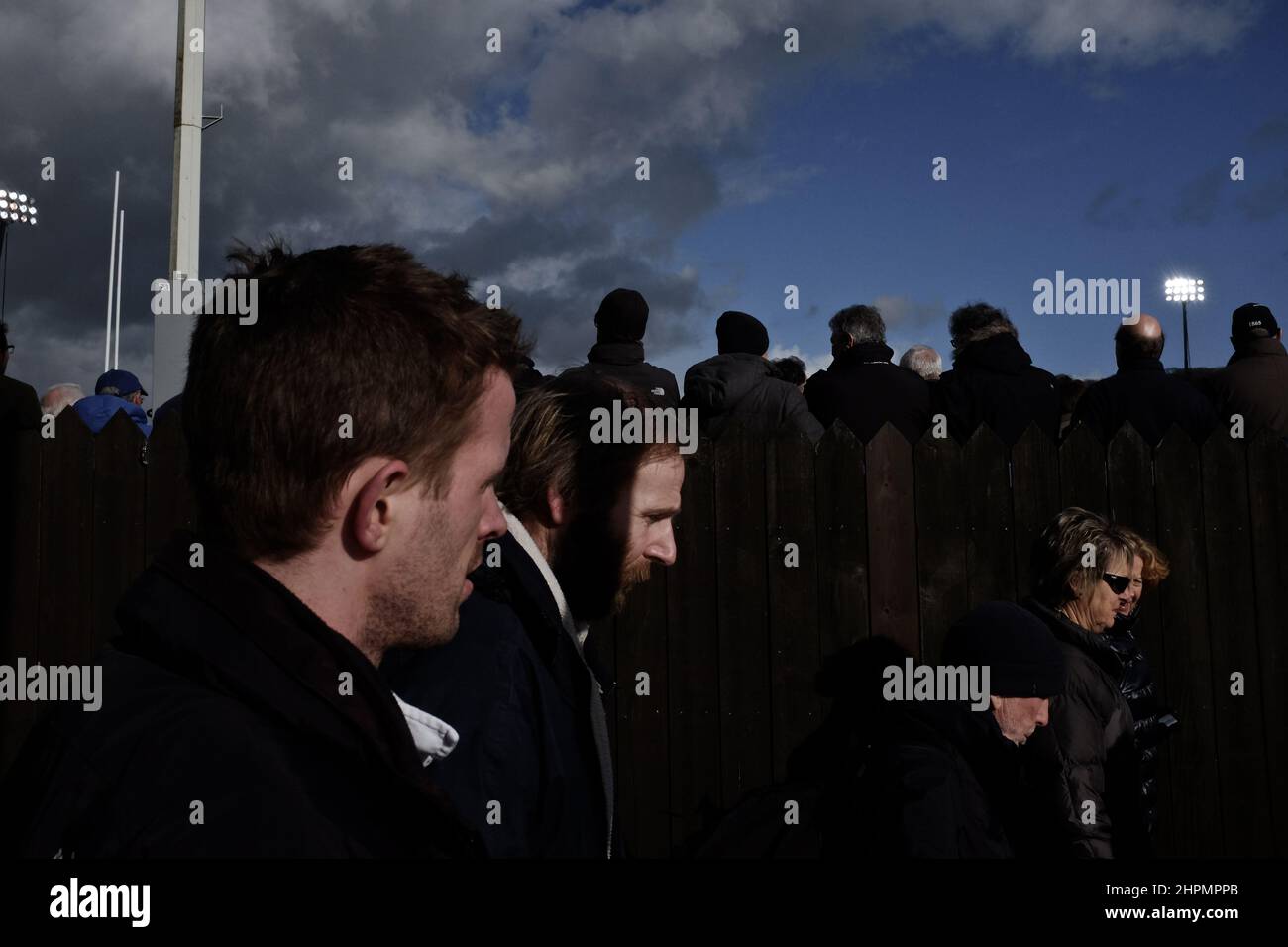 Fans of Bath Rugby on their way to entering the Recreation Ground, "the Rec", Bath Rugby's field. Bath, Somerset, England. Stock Photo