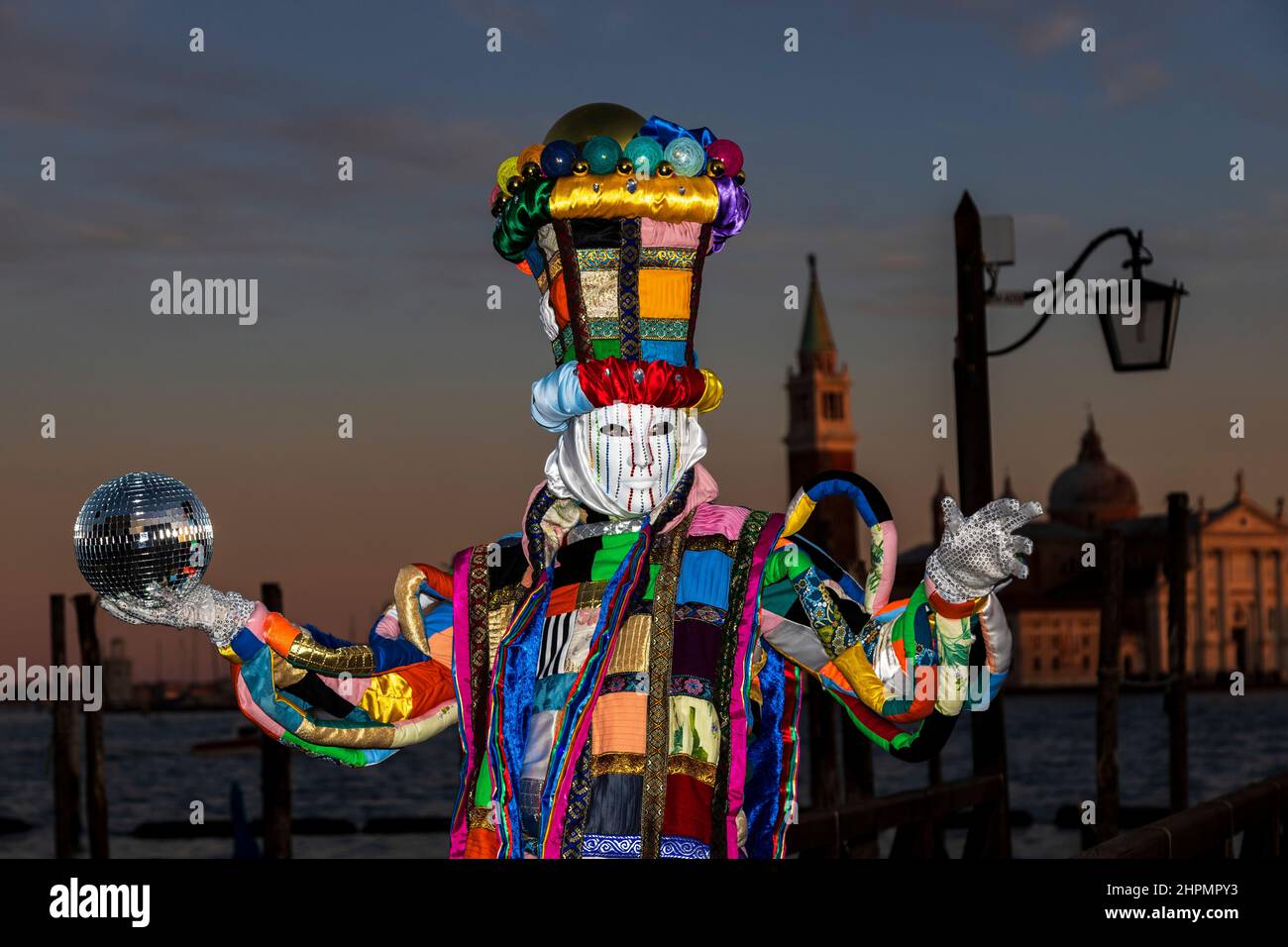 Venice, Italy. 22 February 2022. Carnival in Venice at dusk. Credit: Vibrant Pictures/Alamy Live News Stock Photo