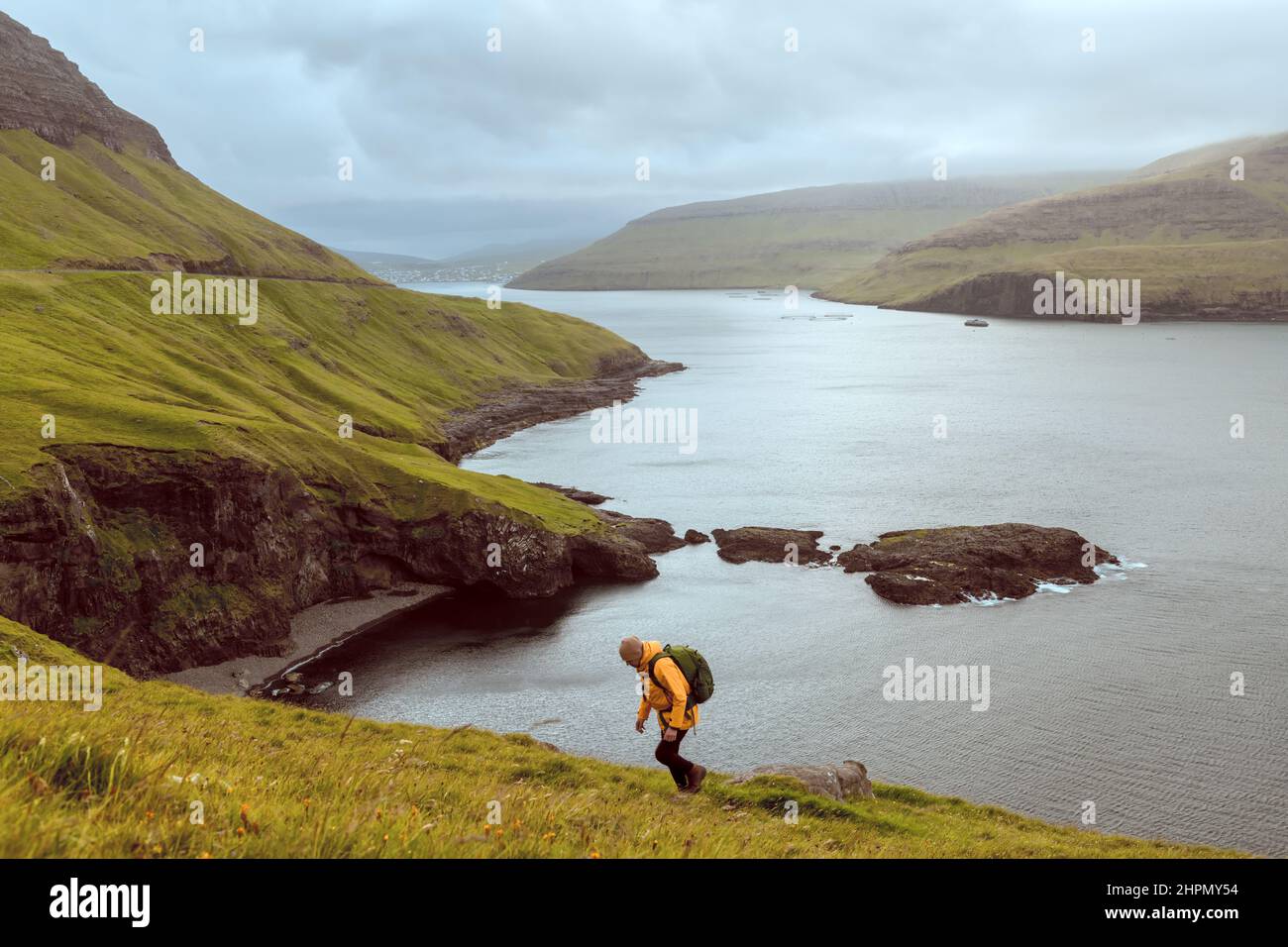 Dramatic View Of Green Hills Of Vagar Island And Sorvagur Town On dramatic-view-of-green-hills-of-vagar-island-and-sorvagur-town-on