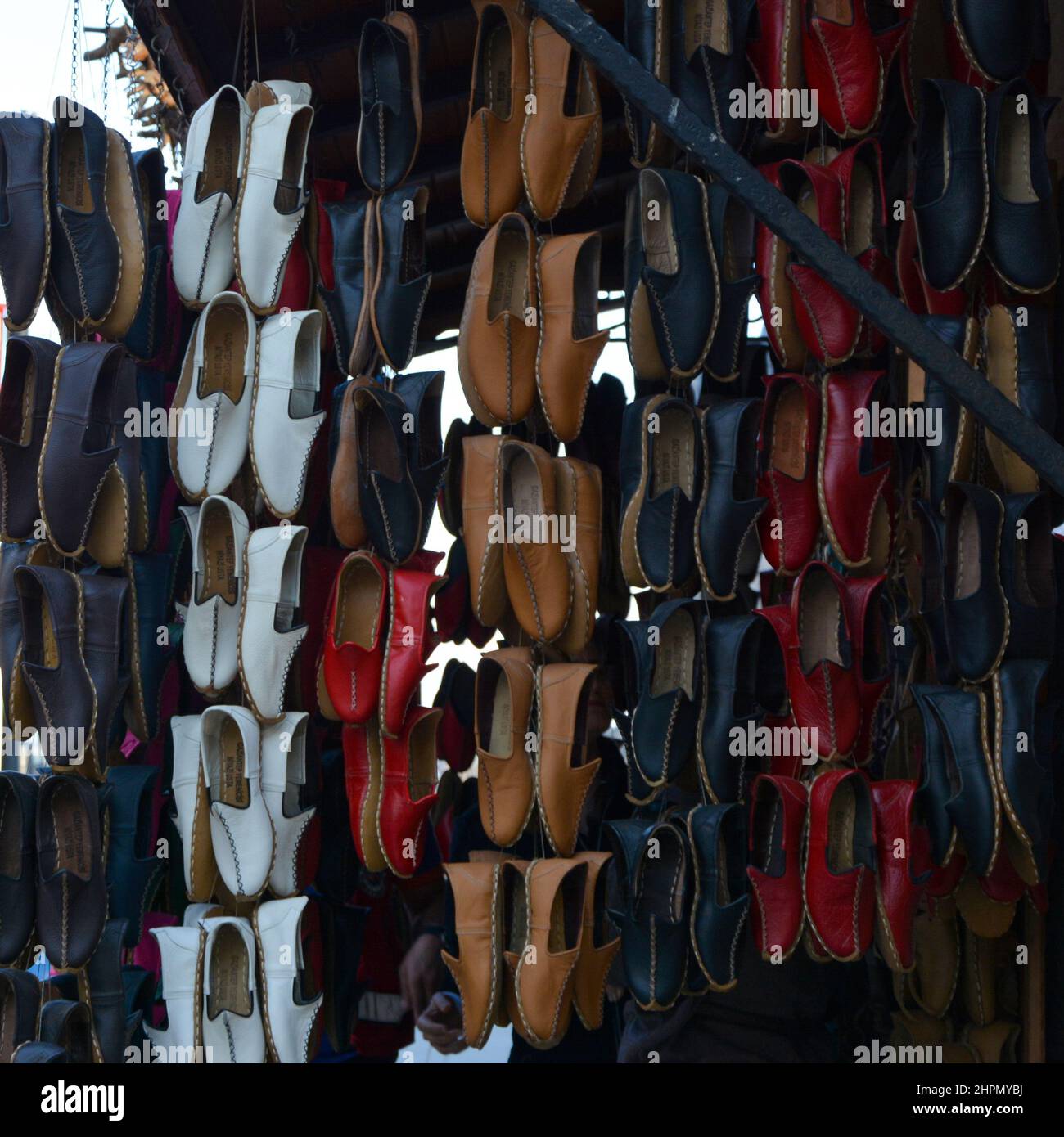 Traditional colorful shoes called yemeni in local language hanging in