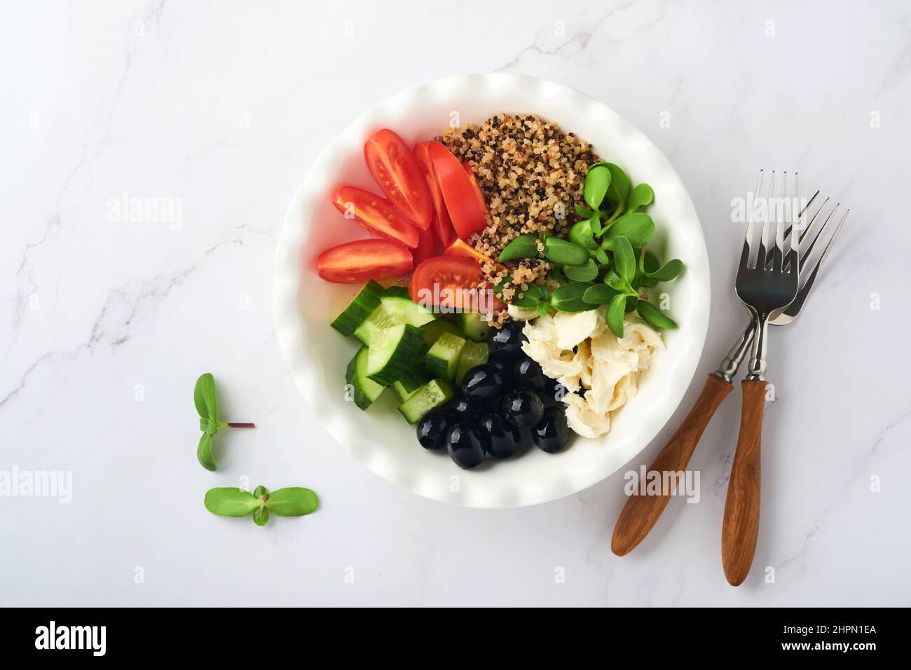 Healthy vegetable lunch from the Buddha bowl with with tomato, cucumber