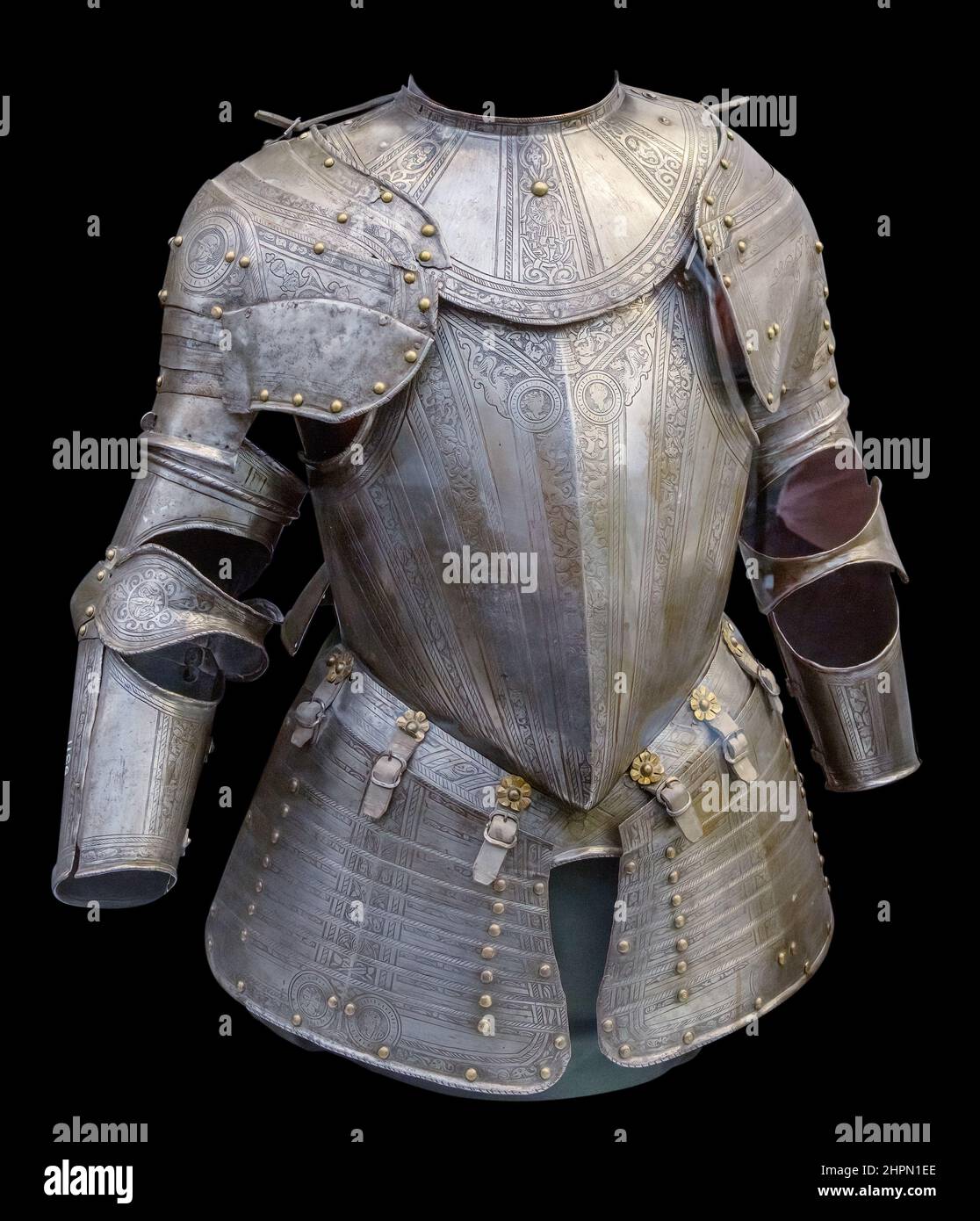 Medieval knight suit of armor protection isolated on black background with clipping path. Ancient steel metal armour Stock Photo
