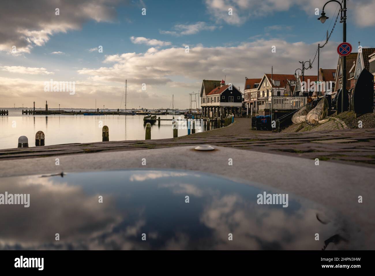 Volendam a tourist place in the Netherlands with the beautiful little houses with orange roofs. Stock Photo