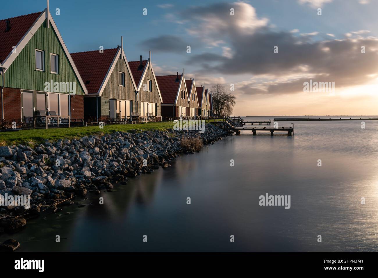 Volendam a tourist place in the Netherlands with the beautiful little houses with orange roofs. Stock Photo