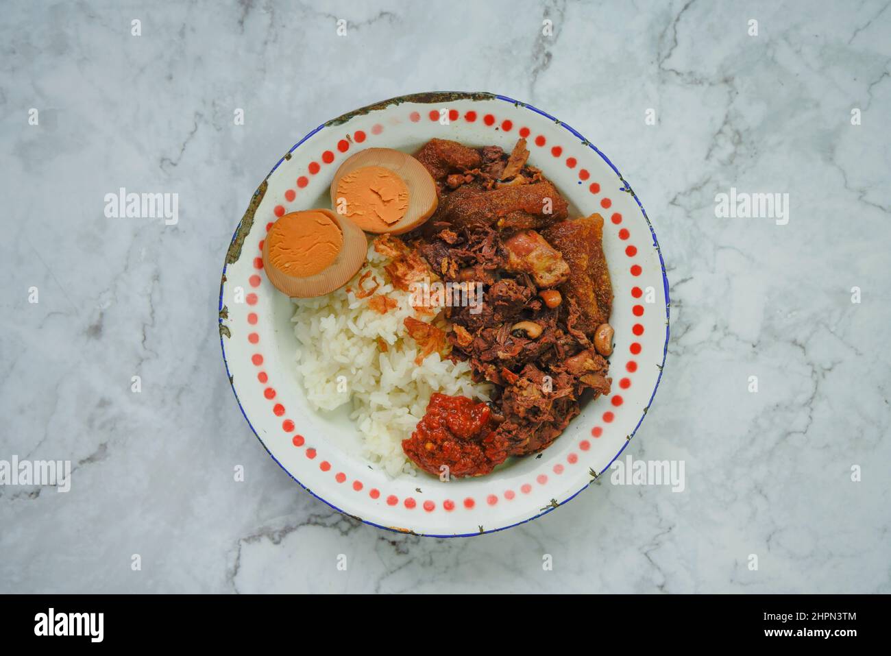 A plate of gudeg, traditional Indonesian food from Jogyakarta. Stock Photo