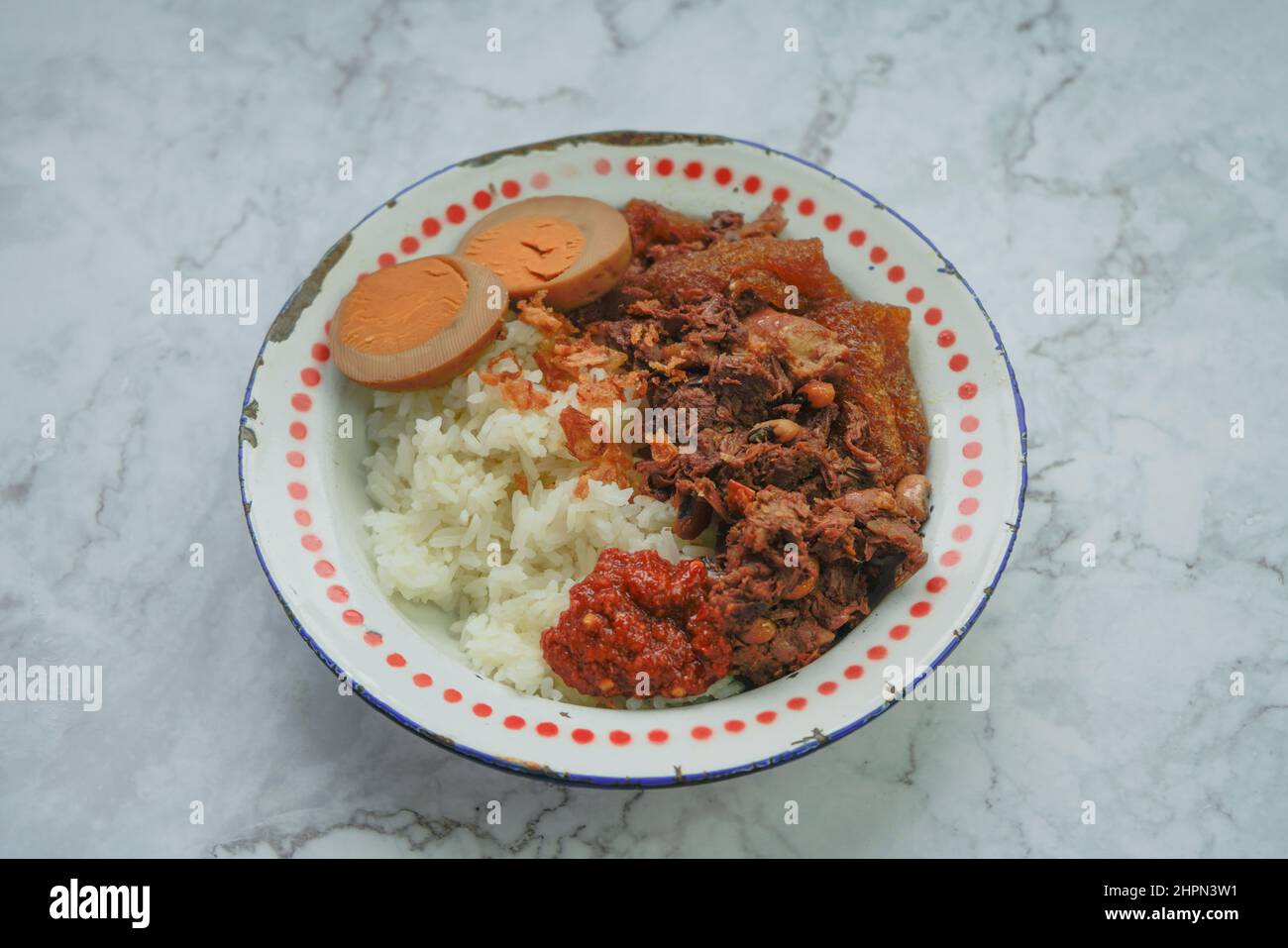 A plate of gudeg, traditional Indonesian food from Jogyakarta. Stock Photo