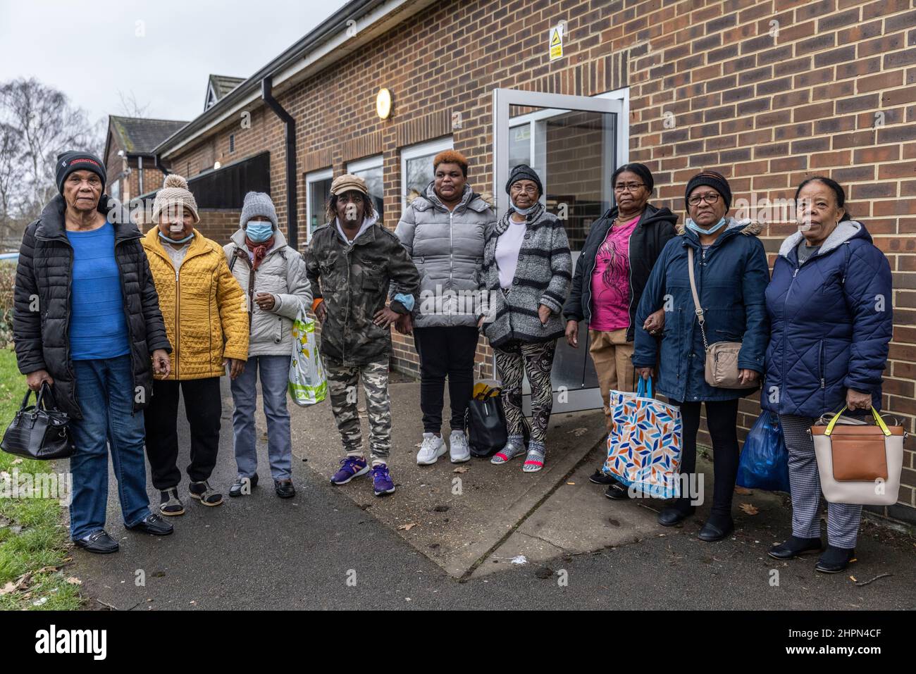 Exiles from Chagos Islands inside Broadfield Community Centre, together they gather in the community hall in Sussex to reminisce about home. Stock Photo