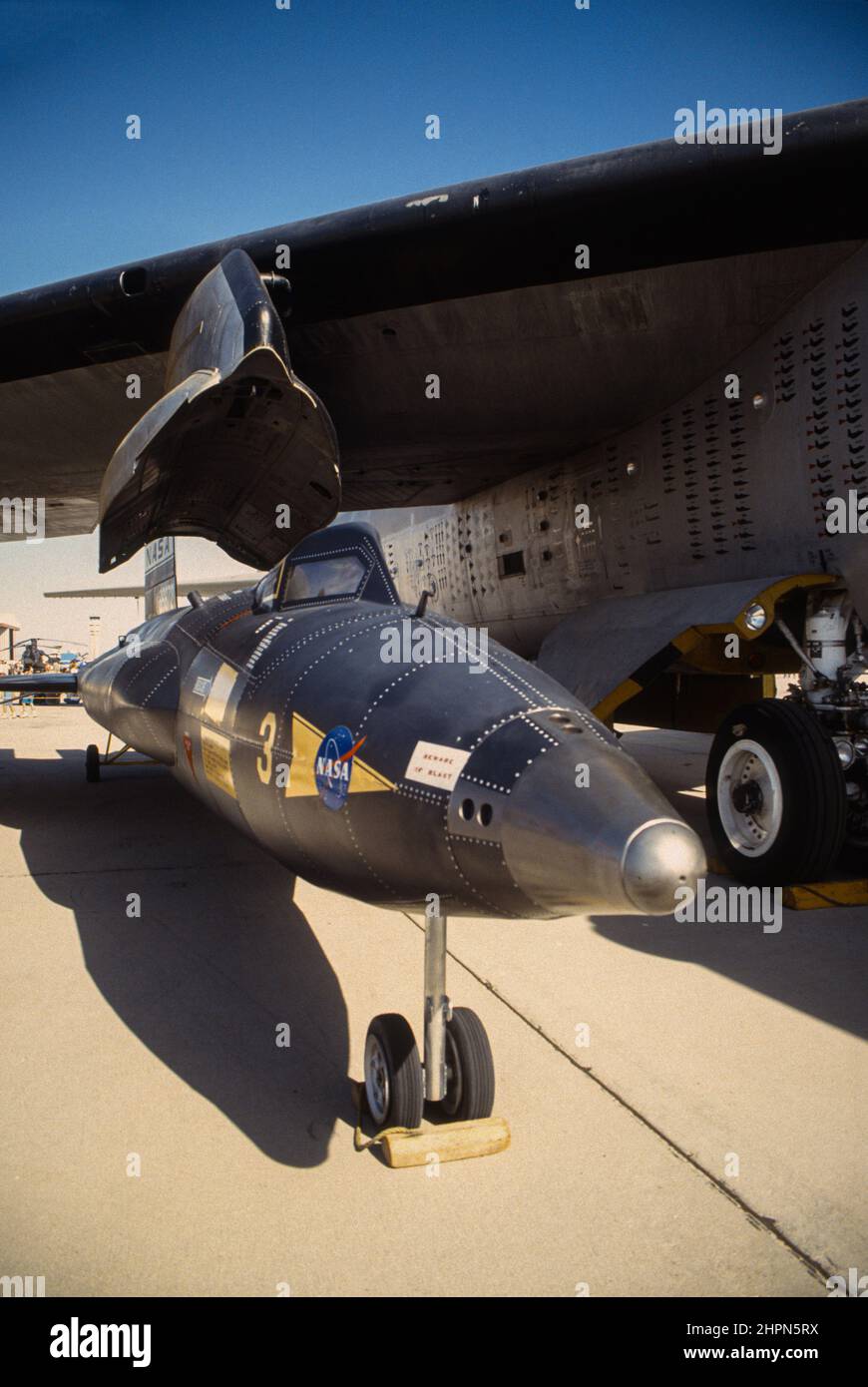 NASA X-15 Number 3 mockup on display at Edwards Air Force base next to NASA B-52 mother ship air drop aircraft. Stock Photo