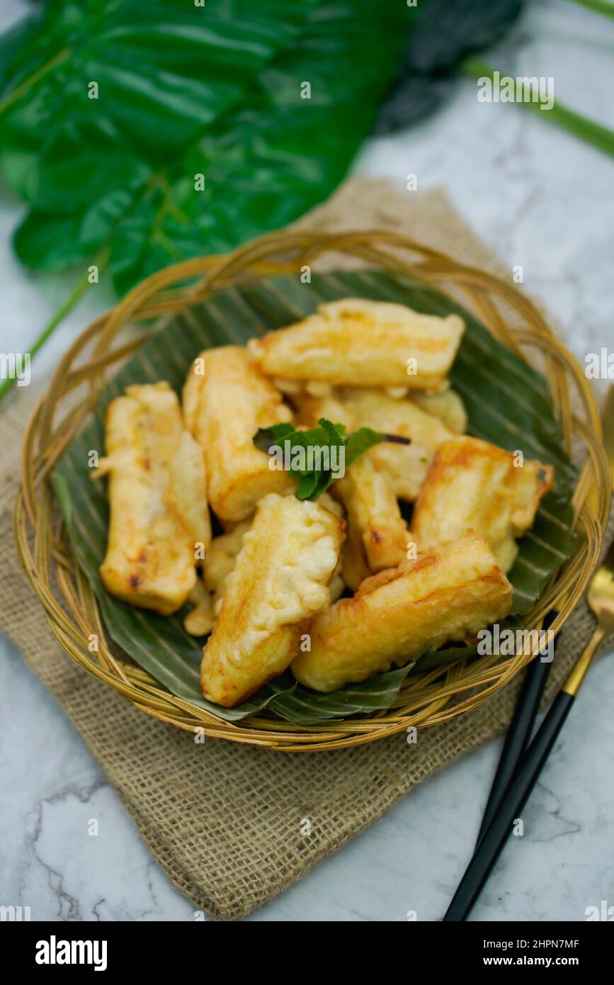 Banana fritters / Pisang Goreng Indonesian snack or dessert Stock Photo -  Alamy, image size:867x1390