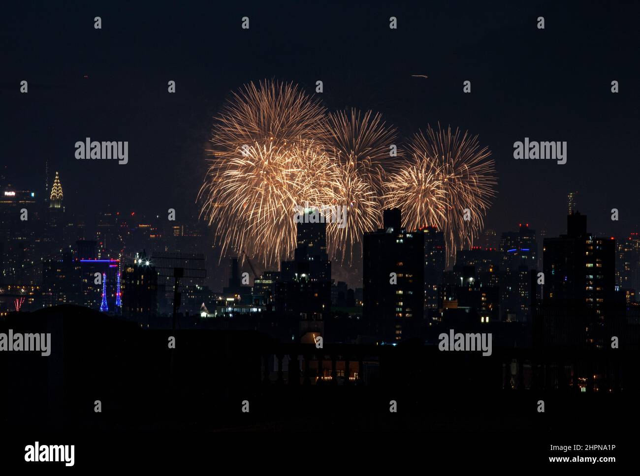 Fireworks on New York City's East River explode on the 4th of July
