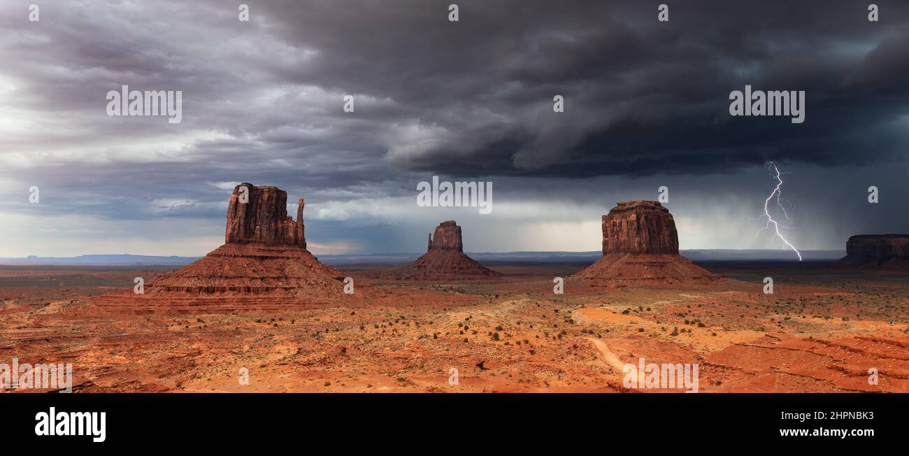 Monument Valley, Arizona lightning storm over the Mittens Stock Photo