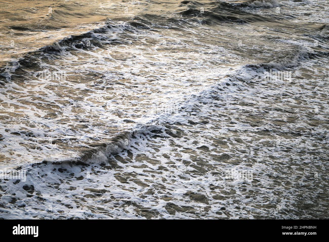 Beautiful blue sea waves with white foam on the Black Sea photographed close-up Stock Photo