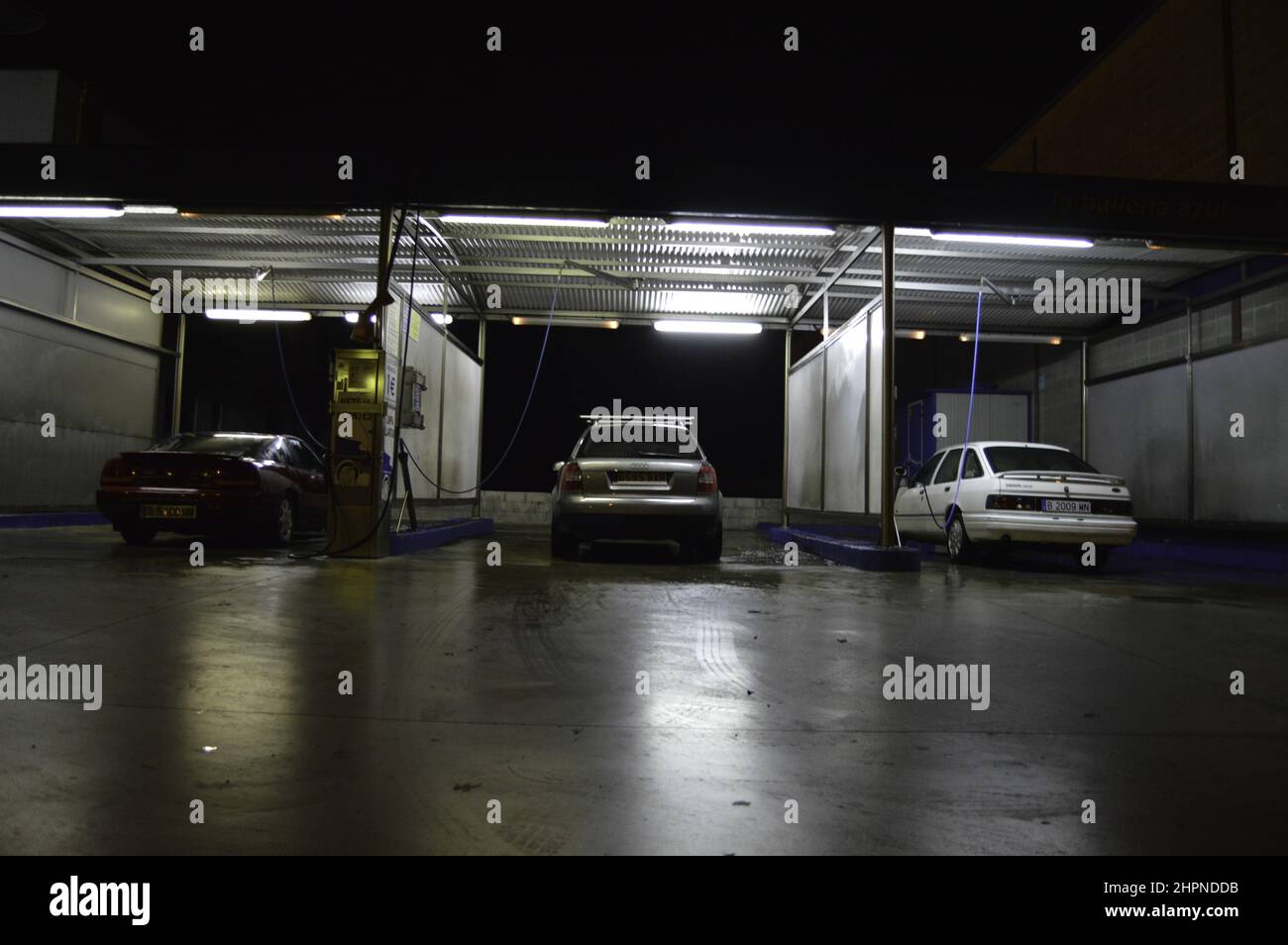 Old classic cars in a Self Service Car Wash at night Stock Photo Alamy