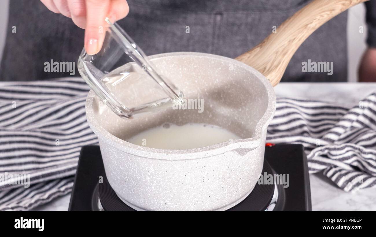 Step by step. Preparing tangzhong in a small saucepan to bake homemade