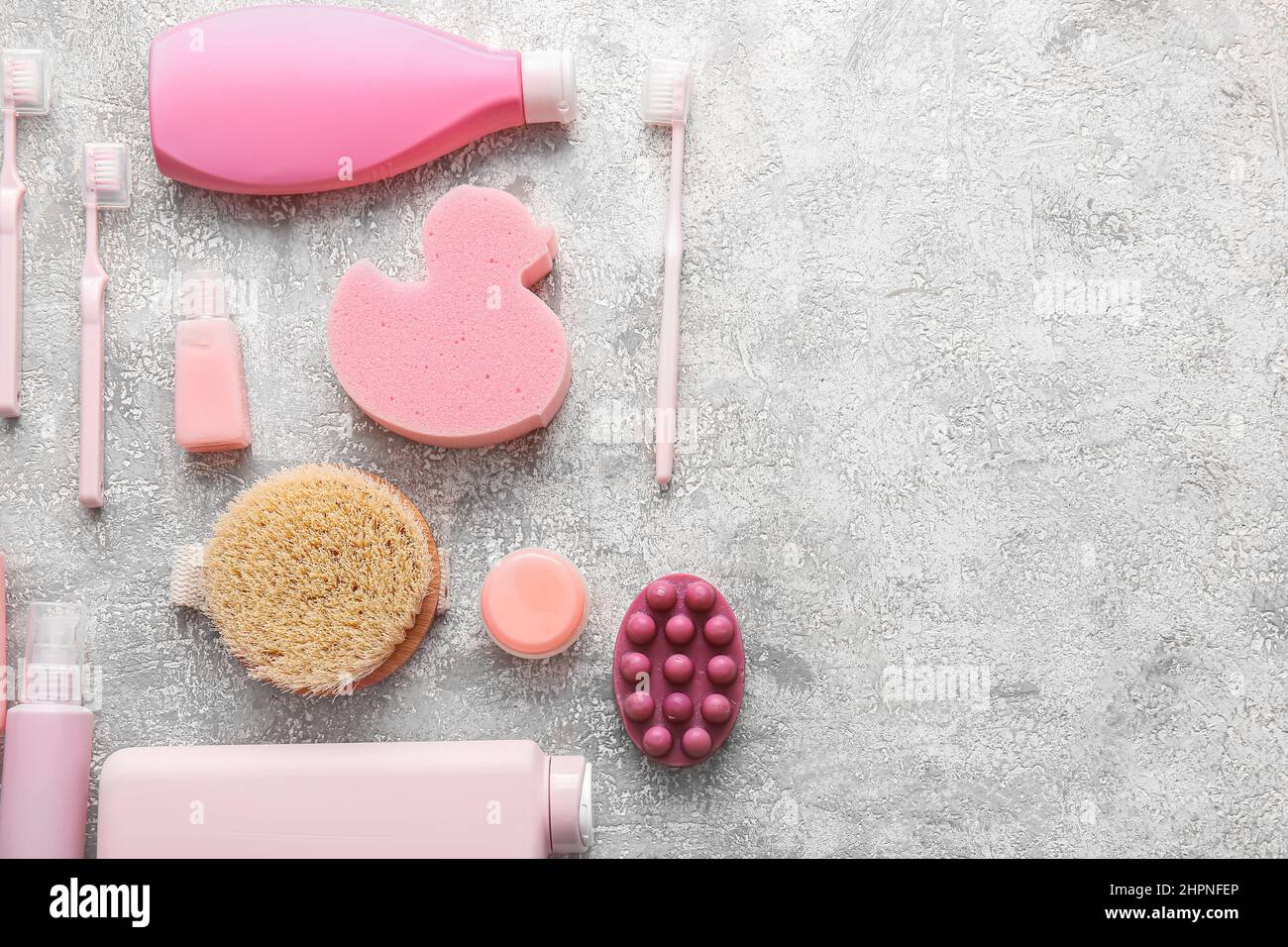 Composition with bath accessories and cosmetic products on grunge