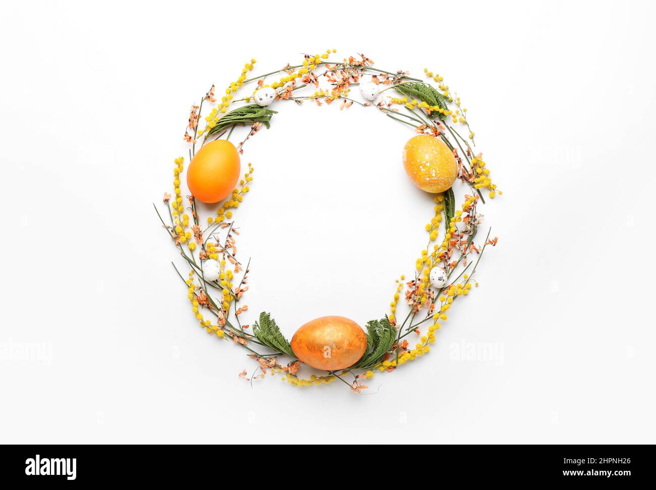 Stylish wreath with Easter eggs and flowers on white background Stock ...
