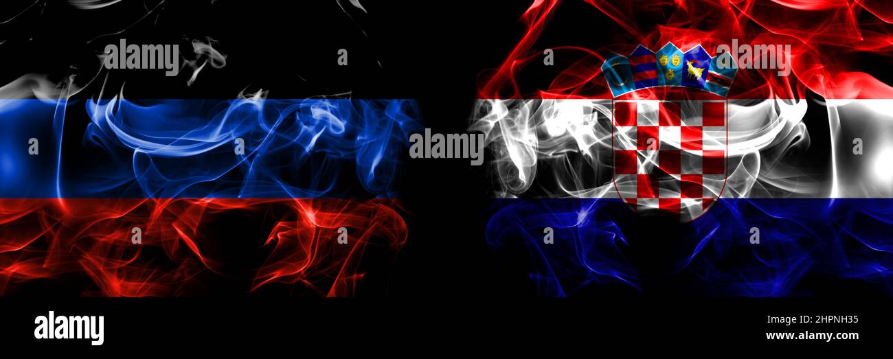 Donetsk People's Republic vs Croatia, Croatian flag. Smoke flags placed side by side isolated on black background. Stock Photo