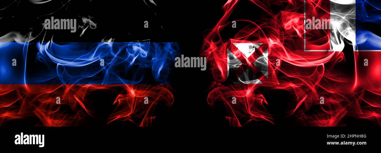 Donetsk People's Republic vs France, French, Wallis and Futuna flag. Smoke flags placed side by side isolated on black background. Stock Photo