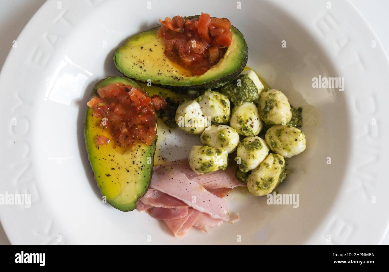 Mixed antipasto, avocado, salsa, mozzarella balls, cooked ham Stock Photo Alamy