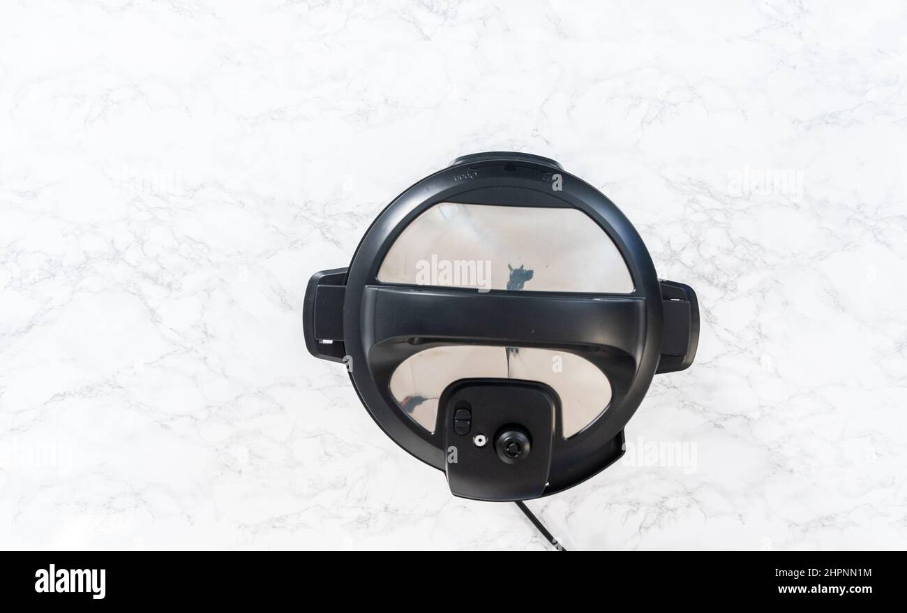 Flat lay. Cook nopeel hardboiled eggs in a pressure cooker Stock