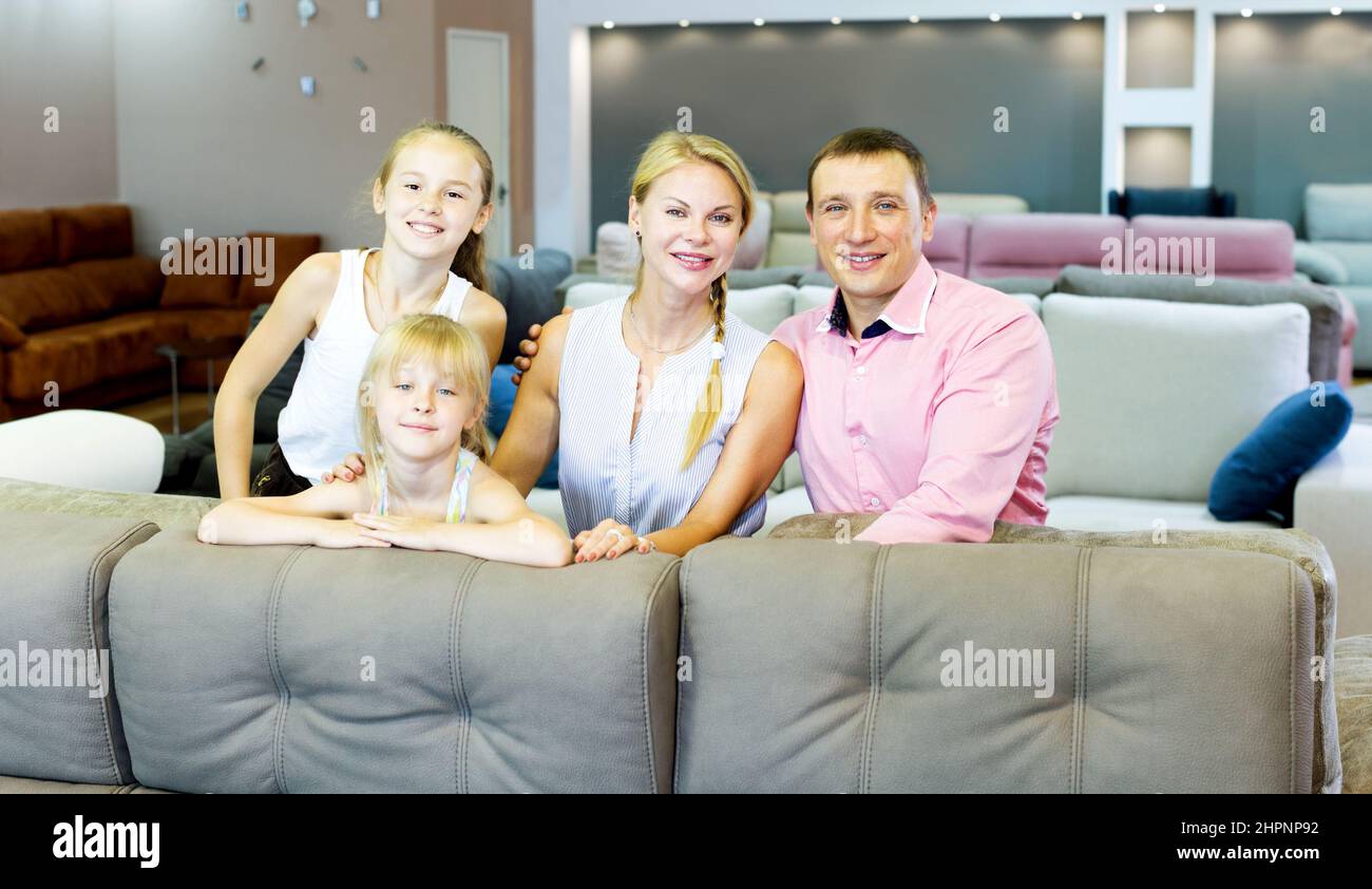 Family which is choosing new sofa Stock Photo Alamy