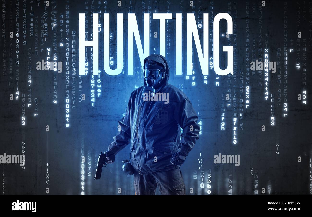Faceless hacker with inscription Stock Photo