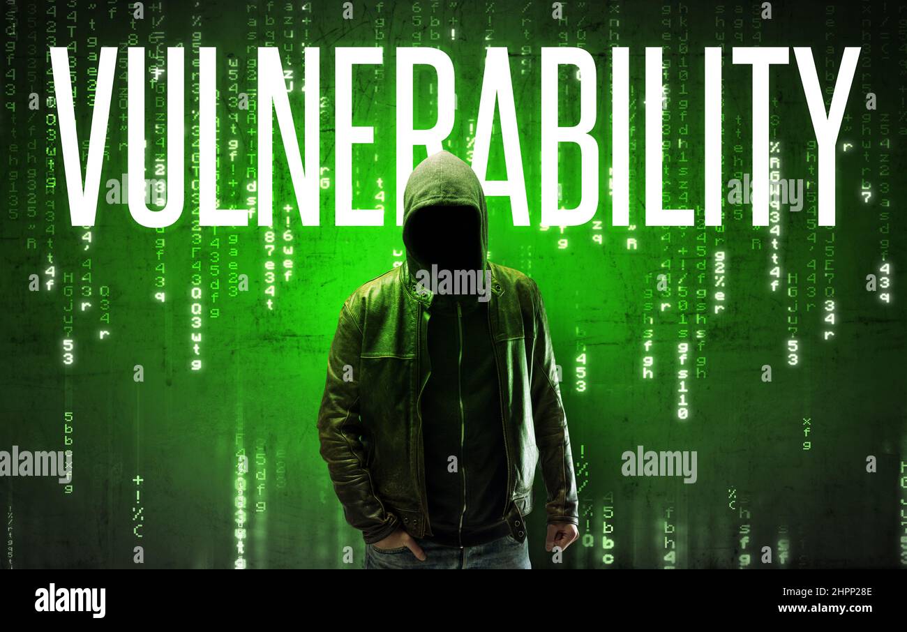 Faceless hacker with inscription Stock Photo