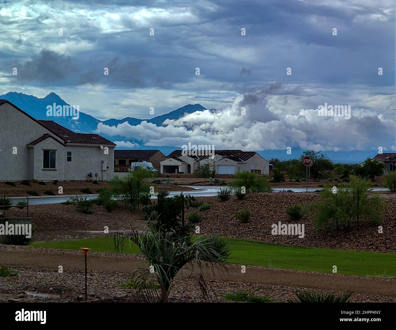 Shot of a monsoon clouds over houses in Sahuarita, Arizona Stock Photo