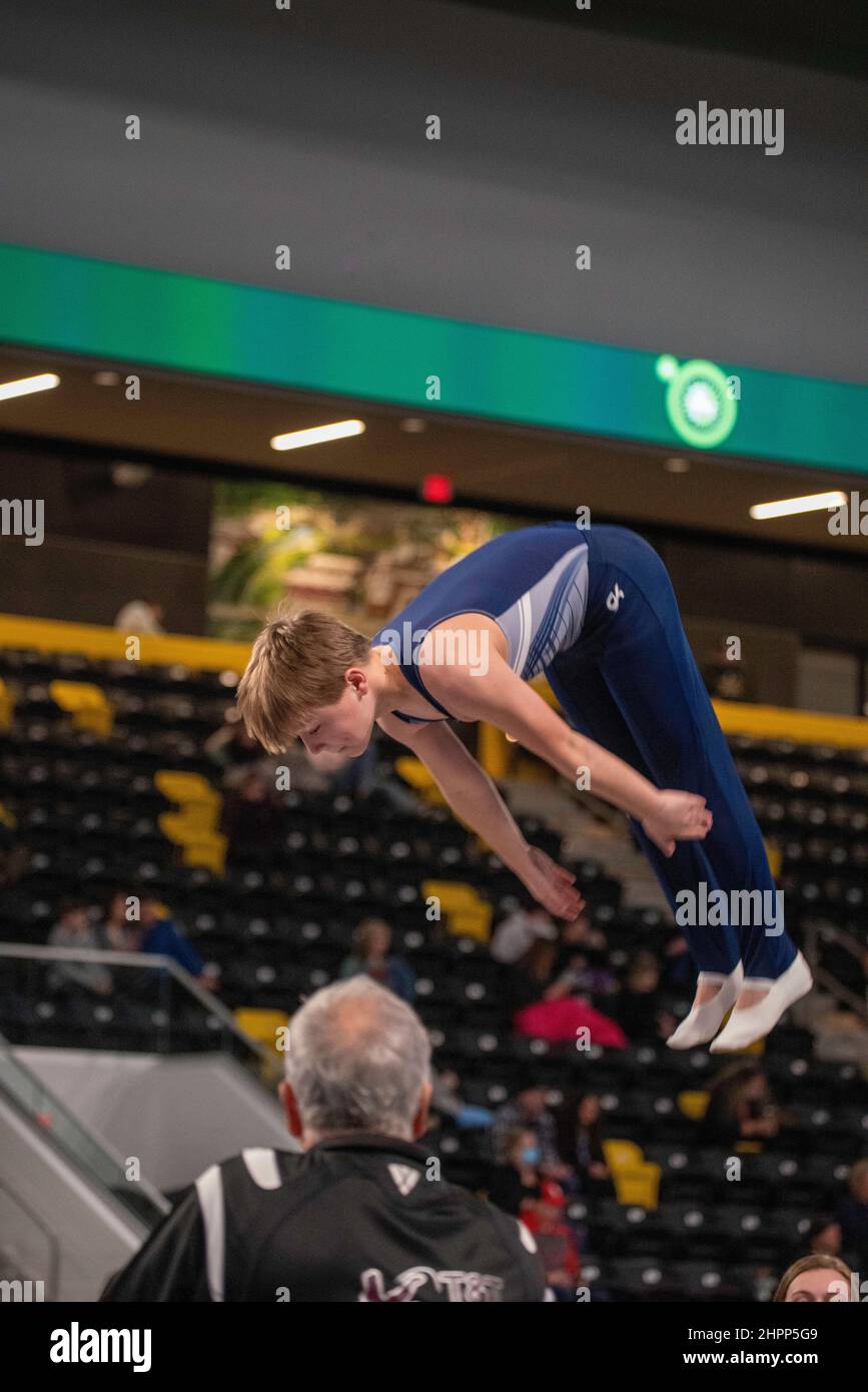 Photograph of young athlete competing at the Winter Wonderland Tumbling