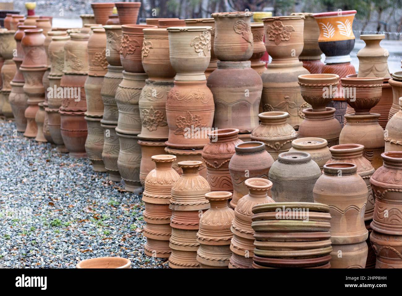 Flower pots stacked in a market for sale Stock Photo Alamy
