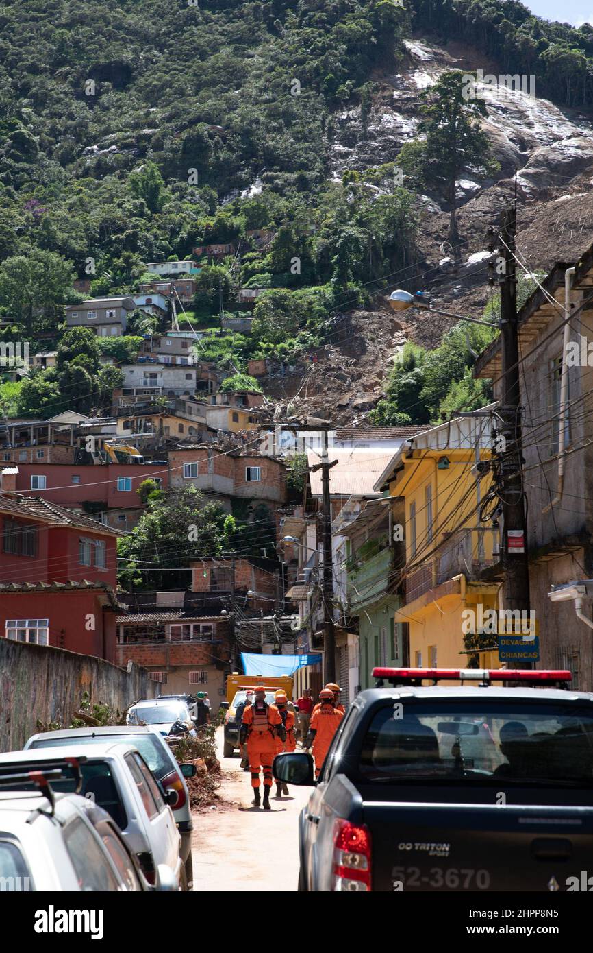 Petropolis, Brazil. 22nd Feb, 2022. Members of local fire department head towards the affected area in Petropolis in the state of Rio de Janeiro, Brazil, Feb. 22, 2022. The death toll rose to 185 from record rainfalls and subsequent mudslides and floods in the Brazilian city of Petropolis, north of Rio de Janeiro, local authorities said Tuesday. Credit: Wang Tiancong/Xinhua/Alamy Live News Stock Photo