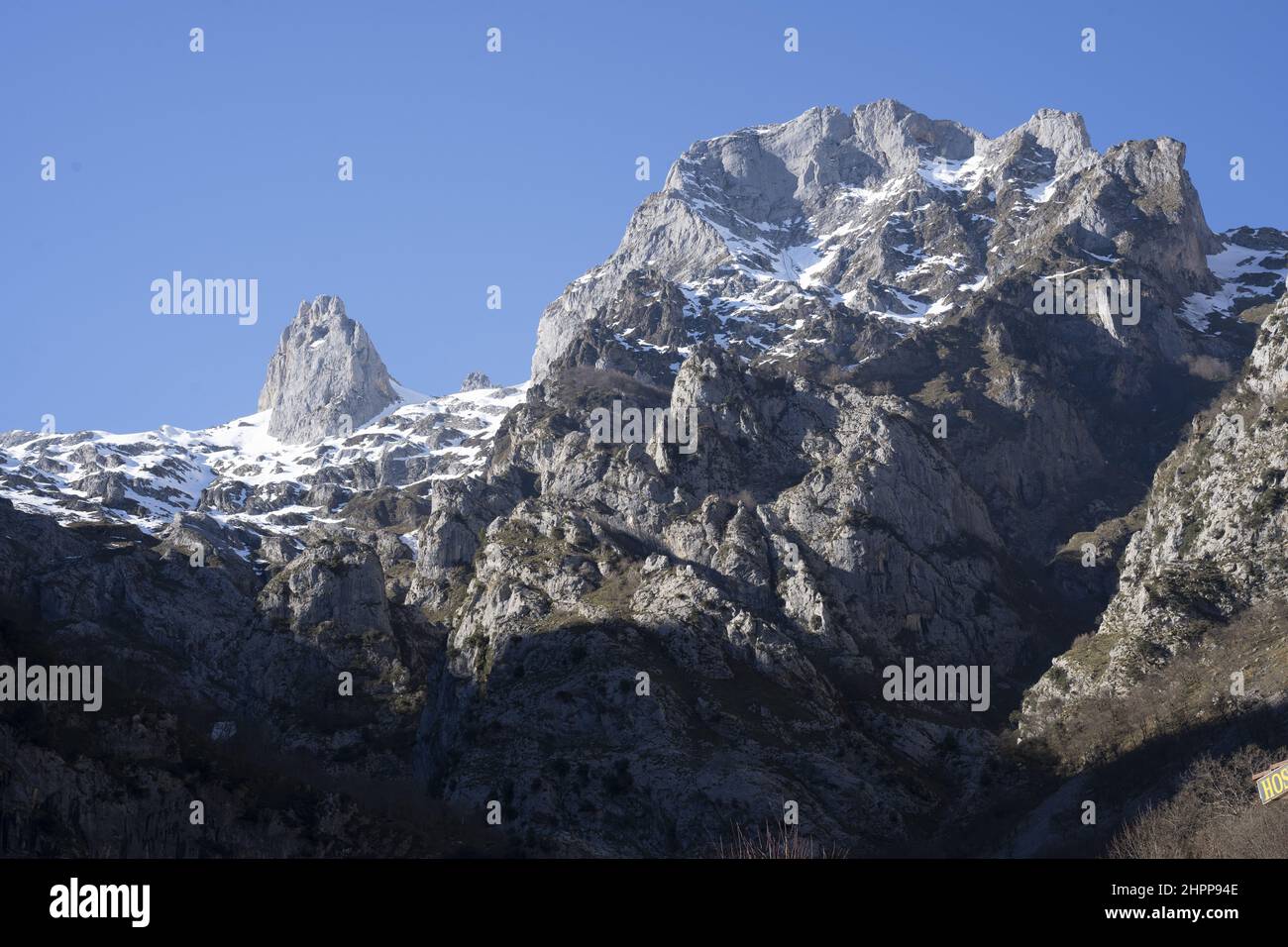 Scenic view of the rocky mountain range covered with snow against a ...