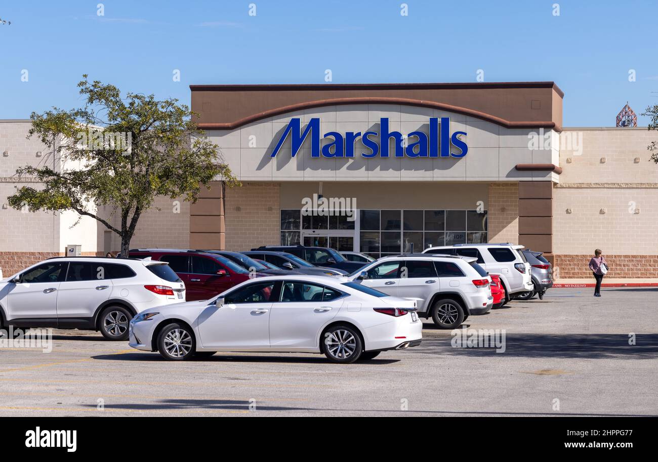 Marshalls store front with lots of cars parked outside on a sunny day. Clothing retail outlet building façade Stock Photo