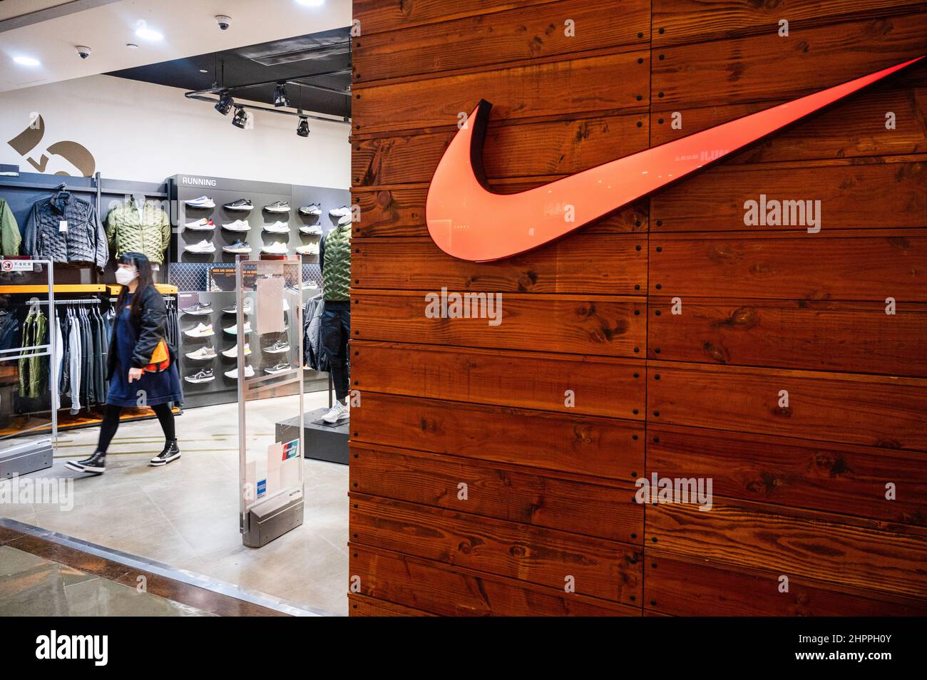 Hong Kong, China. 08th Feb, 2022. A shopper is seen at the American  multinational sport clothing brand, Nike store in Hong Kong. (Photo by  Budrul Chukrut/SOPA Images/Sipa USA) Credit: Sipa USA/Alamy Live