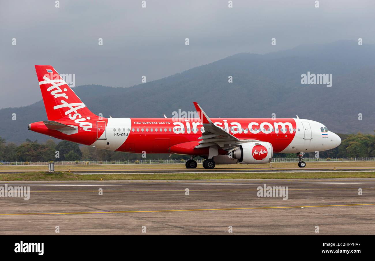Chiang Mai, Thailand. 22nd Feb, 2022. Thai AirAsia airplane runs on the runway at Chiang Mai International Airport (CNX). Thailand has raised the COVID-19 alert to level 4 following a sharp increase in omicron variant infections nationwide. Credit: SOPA Images Limited/Alamy Live News Stock Photo