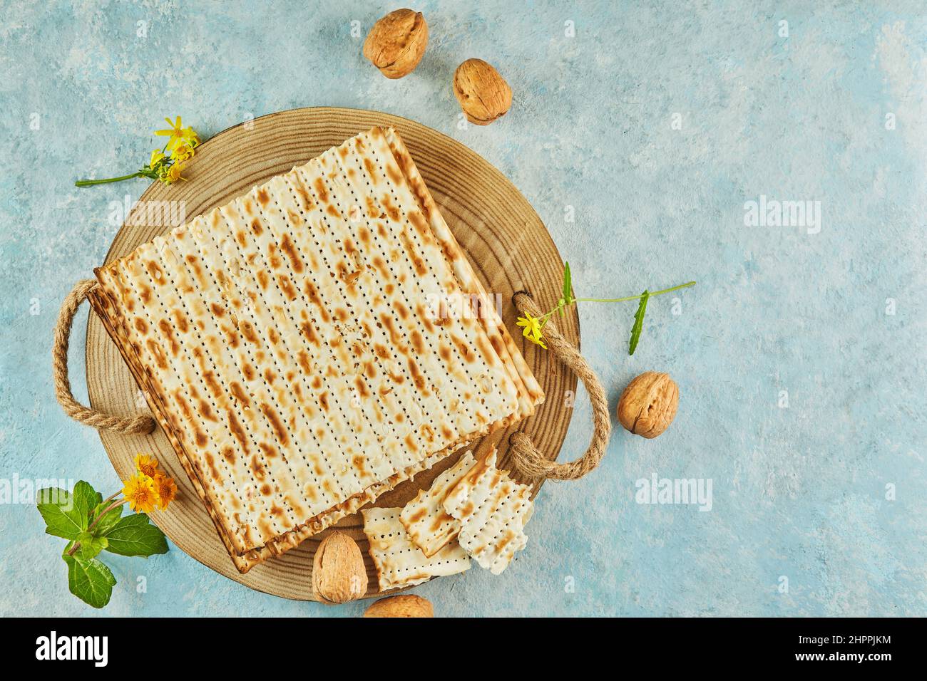 Pesach celebration concept jewish Passover holiday. Matzah on wooden